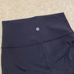 Lululemon basic black wunder under leggings; size 4